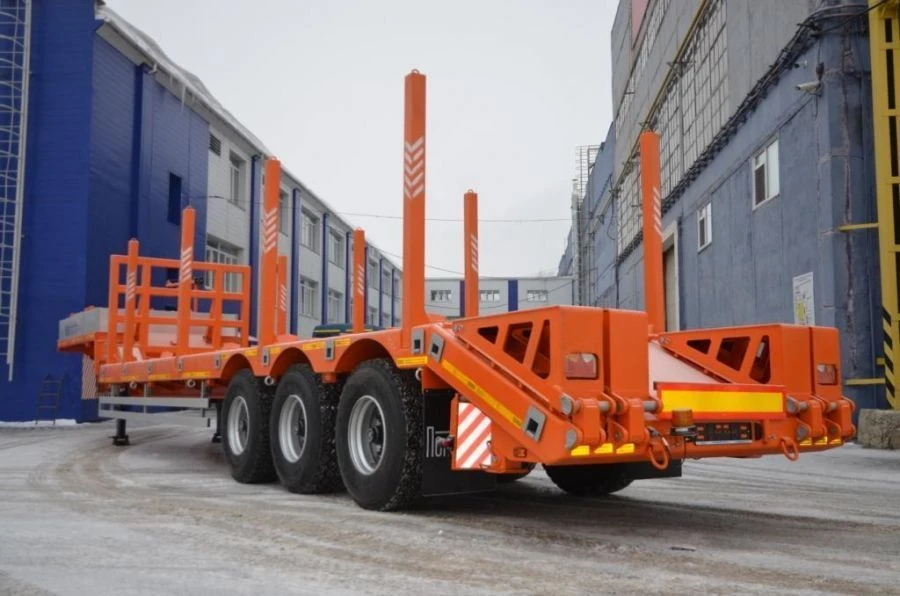 Heavy-Duty Semi-Trailer for Transporting Wheeled and Tracked Equipment with Ramps" 94163-050
