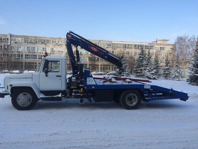 Автомобиль эвакуатор с краноманипуляторной установкой (КМУ) производства АО "ИНМАН" типа 47121, модификации 47121G на базе шасси