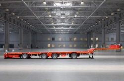 Specialized TverstroyMash Semi-Trailer 993941 Modification 0022 for Transporting Heavy Loads